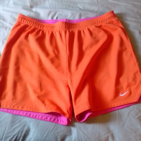 2 pairs Nike activewear shorts - 1 blue white pair, 1 orange pink neon pair - Picture 3 of 7